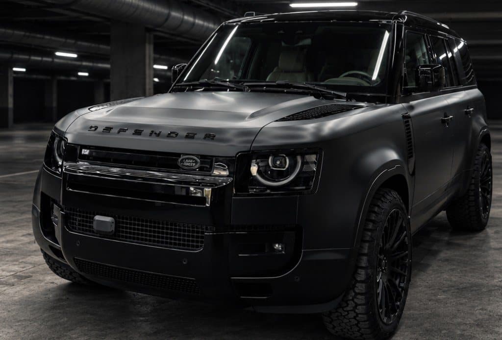 Matte-wrapped Land Rover Defender in the LuxCar garage